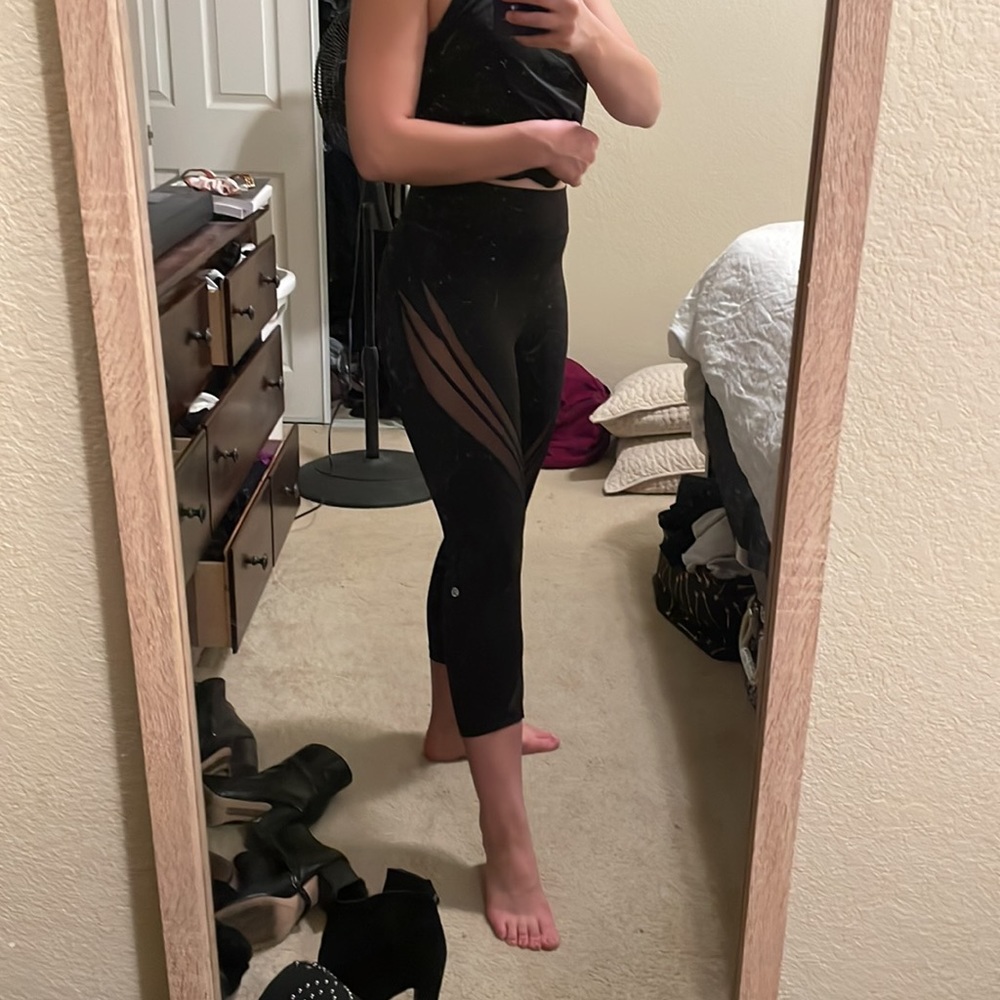 Black lululemon leggings with lace / mesh sides, size 6